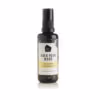Rock Your World Be Happy Spray in een glazen flesje met een wit en geel label waar Be Happy spray op staat.