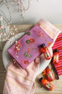 4 mini reisverpakkingen van pip studio. In rode kleine travel size flesjes.