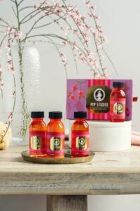 4 mini reisverpakkingen van pip studio. In rode kleine travel size flesjes van 40 ml.