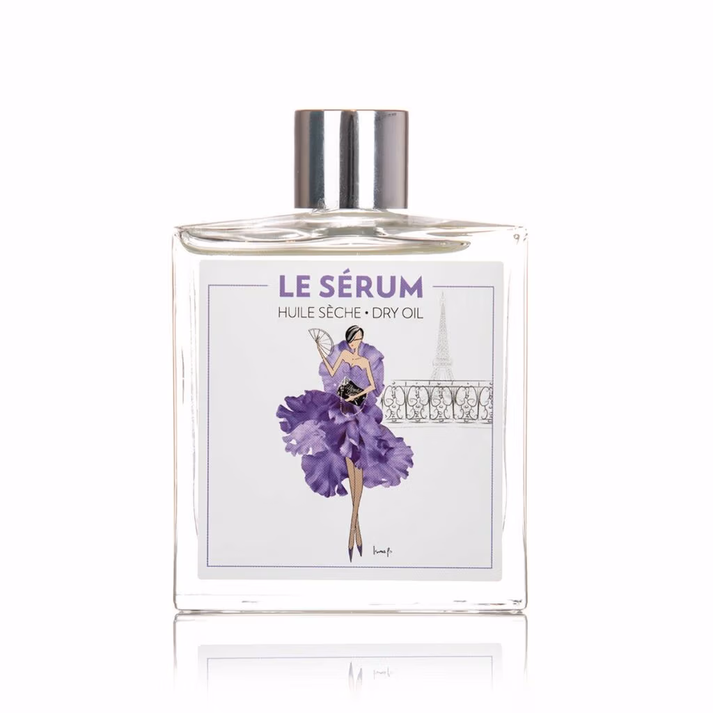 Théophile Berthon Iris en Patchouli Huidolie, glazen fles met label, met een paarse tekening van een vrouw.