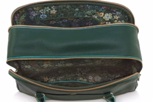 Binnenkant van de Pip Studio Schoudertas Groen met elegant bloemmotief, ruime vakken en praktische indeling voor al je essentials.